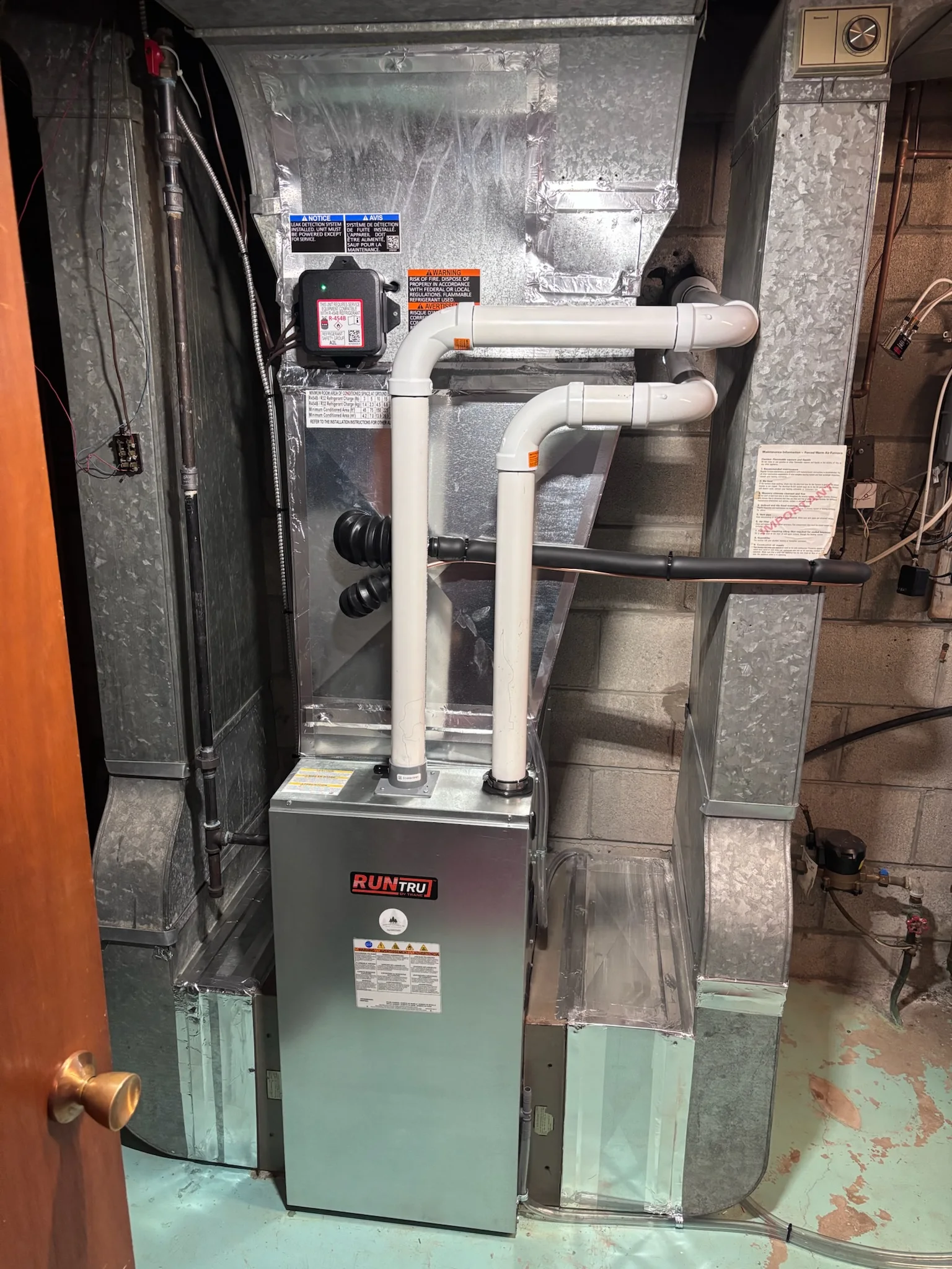 New RunTru by Trane furnace installed with new venting and ductwork